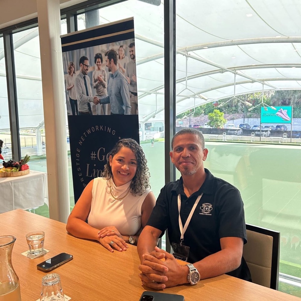 Carlos with his wife at a local event