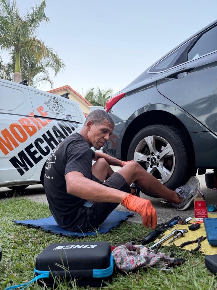 Carlos carrying out an original roadside wheel repair for a customer
